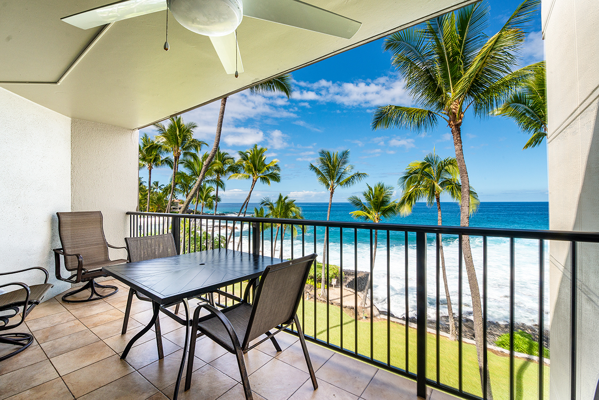 a view of a chairs and table in patio