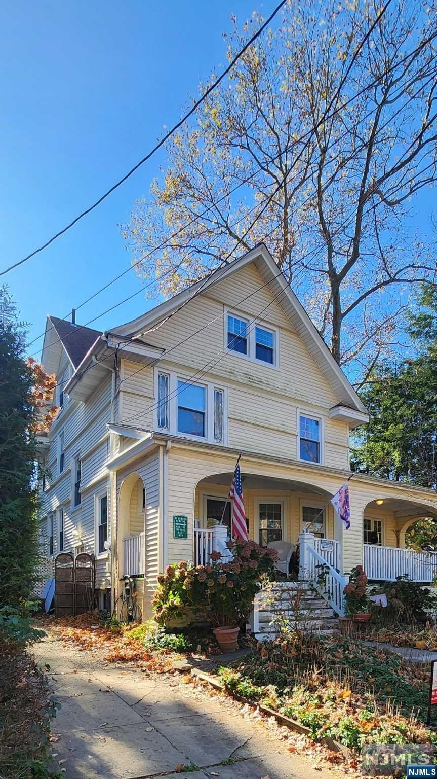 a front view of a house with yard