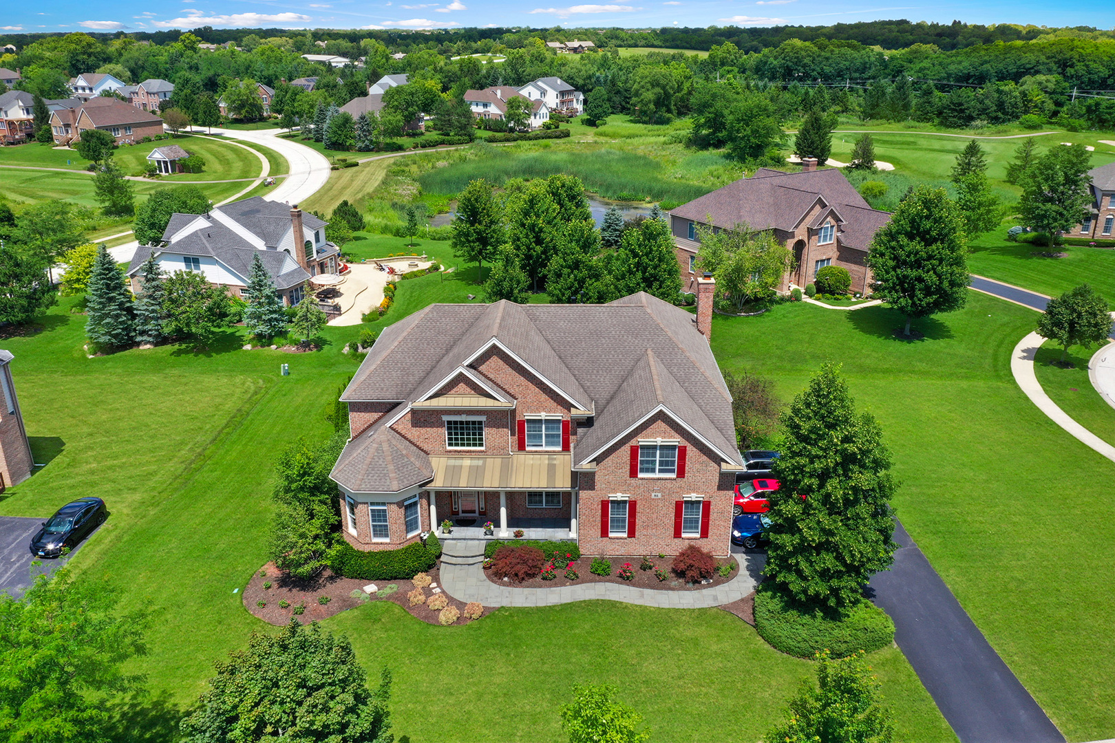 an aerial view of house with swimming pool yard and outdoor seating