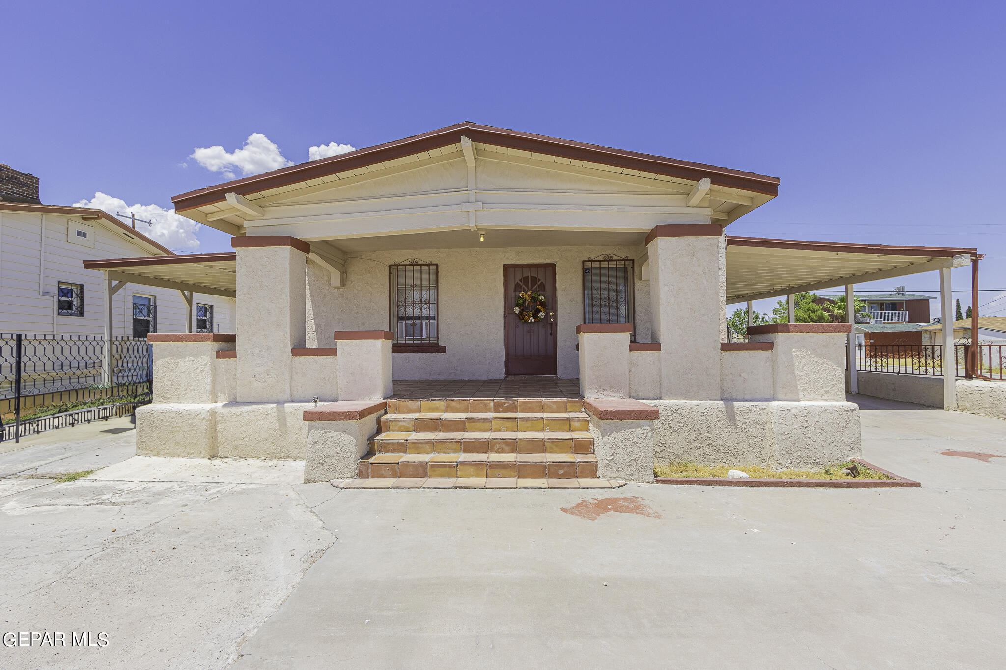 front view of a house with a patio