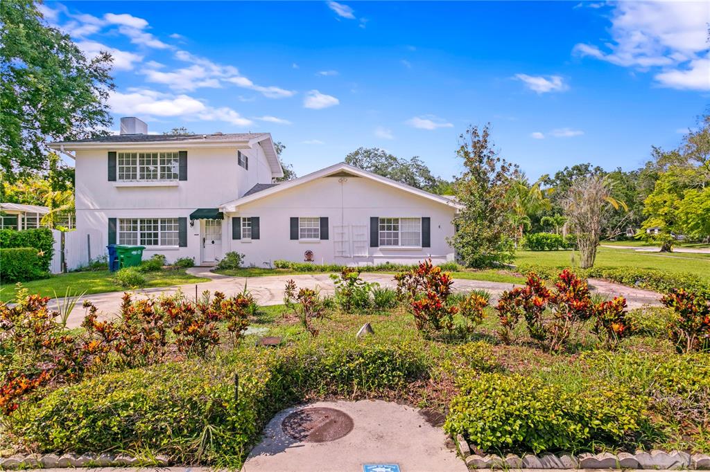 a view of a house with a big yard