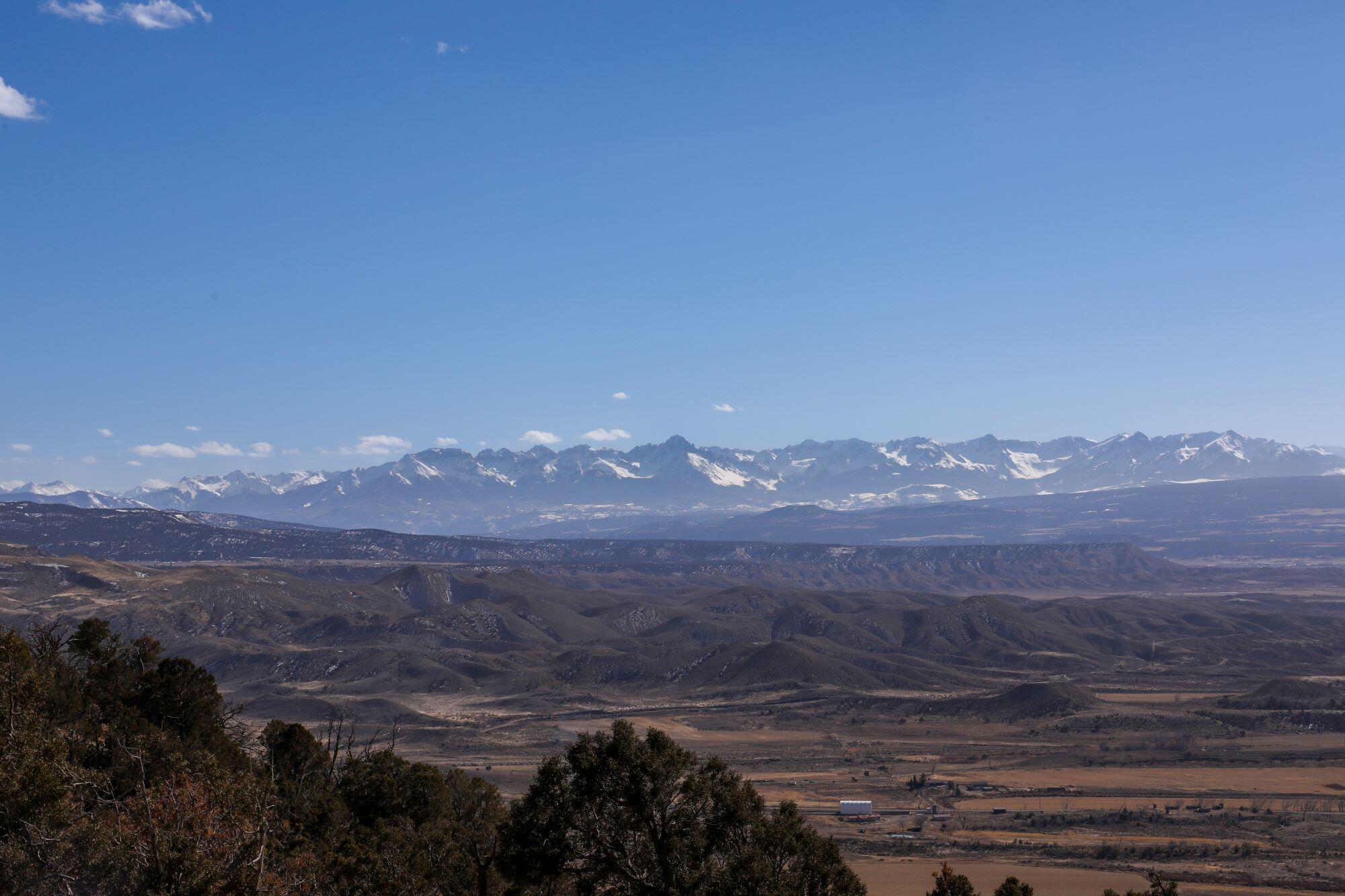 a view of mountain view with mountains in the background