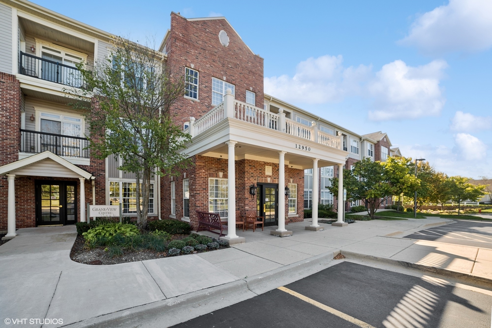 a view of a building with a yard