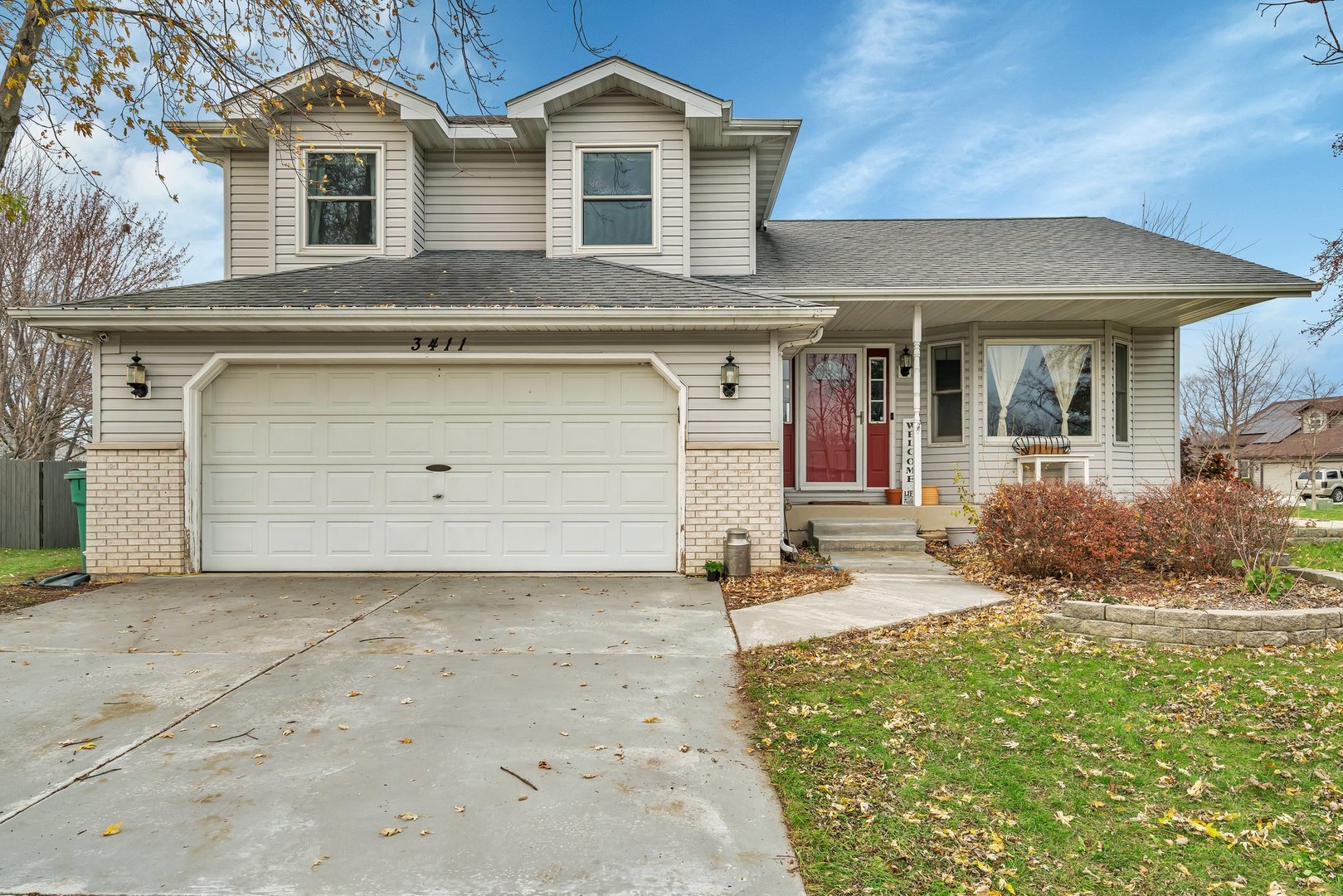 front view of a house with a yard