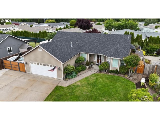 a aerial view of house with a yard