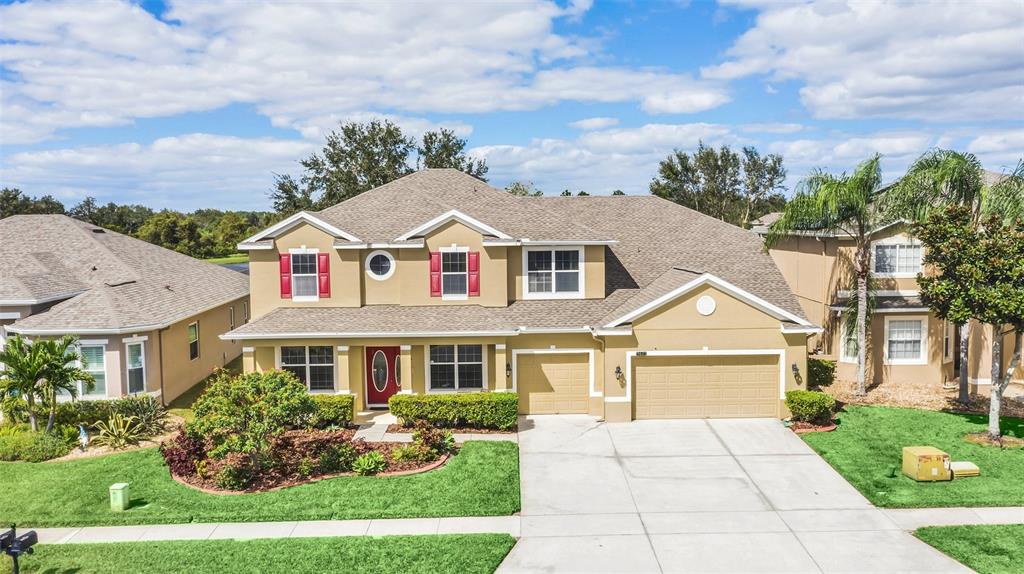 front view of a house with a yard