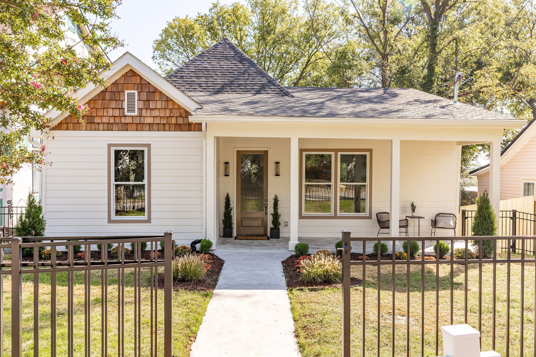 a front view of a house with a yard