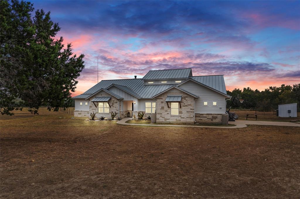 Welcome to a Hill Country beauty spread across 8.5 acres of wide-open space in coveted Watson Place that you can finally call all yours