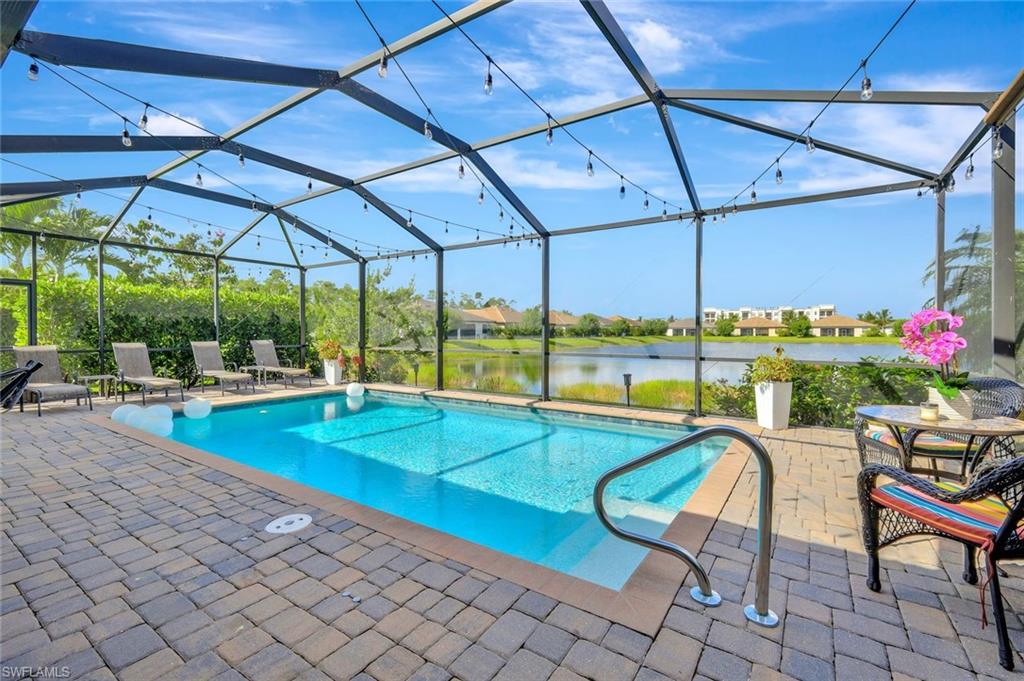 a view of a swimming pool with a porch