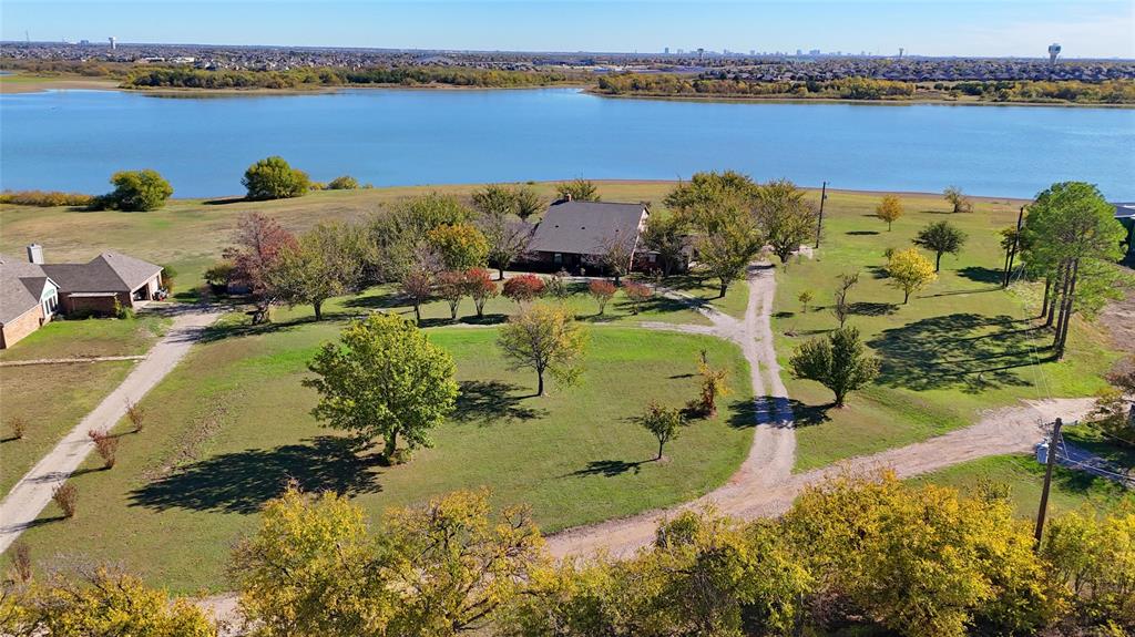 view of a lake with houses