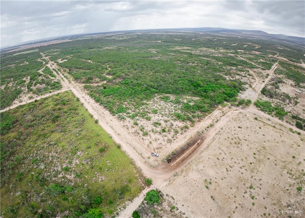 Drone / aerial view featuring a mountain view