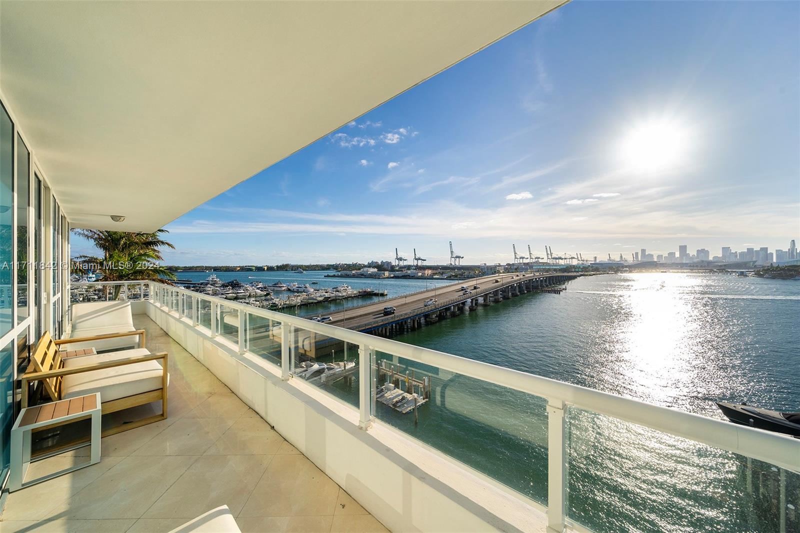 a view of a balcony with ocean view