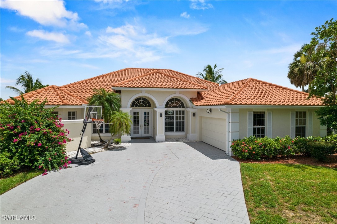 a front view of a house with yard