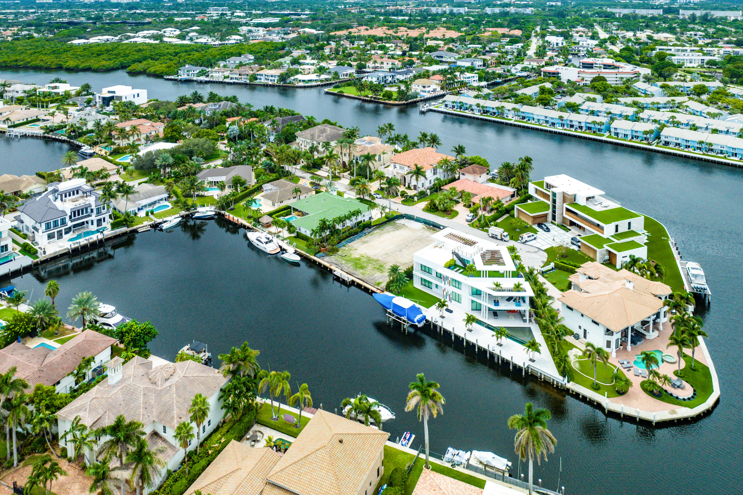 an aerial view of a house with a lake view