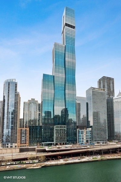 a view of a city with tall buildings