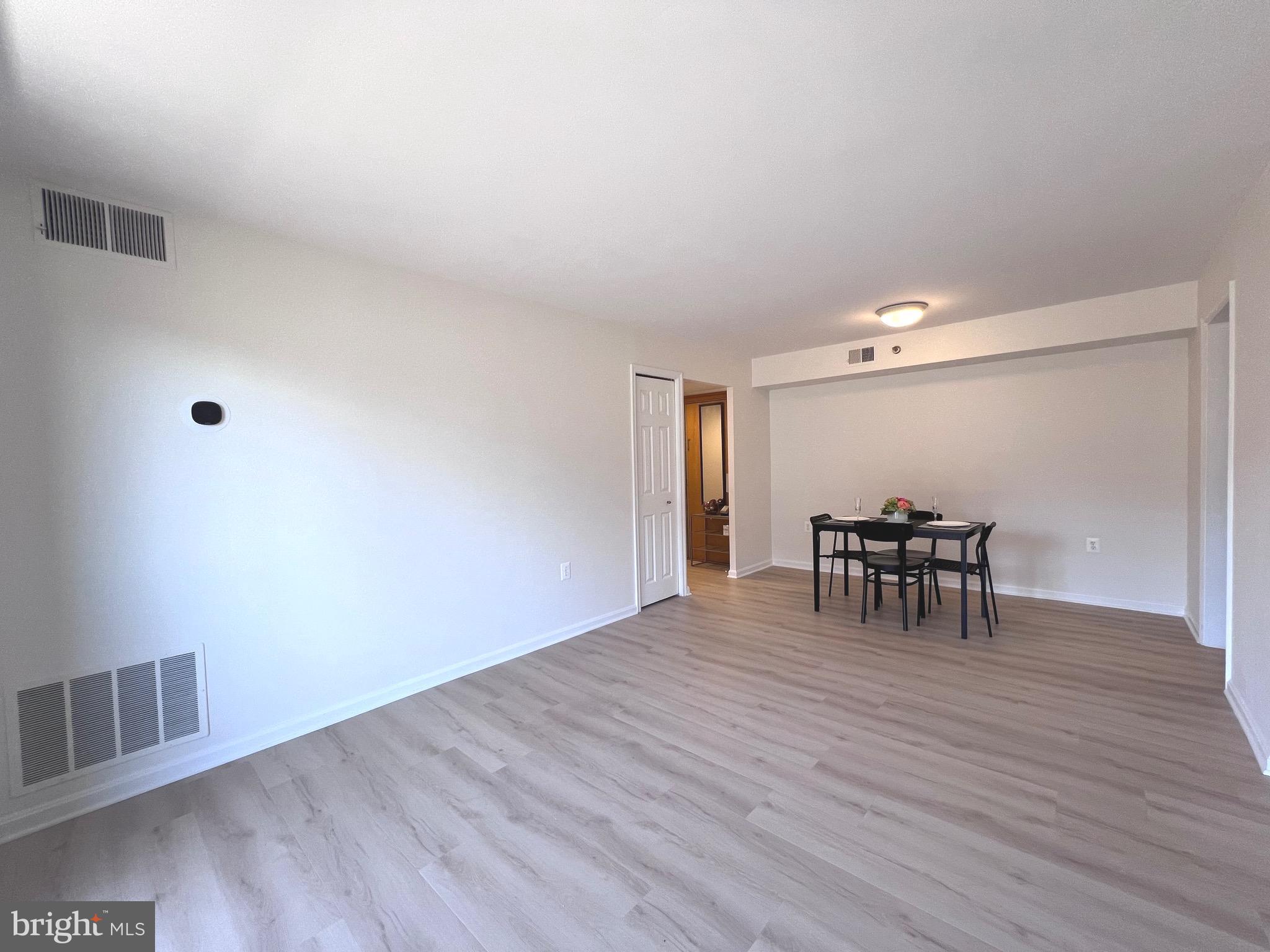 a view of livingroom with furniture and wooden floor