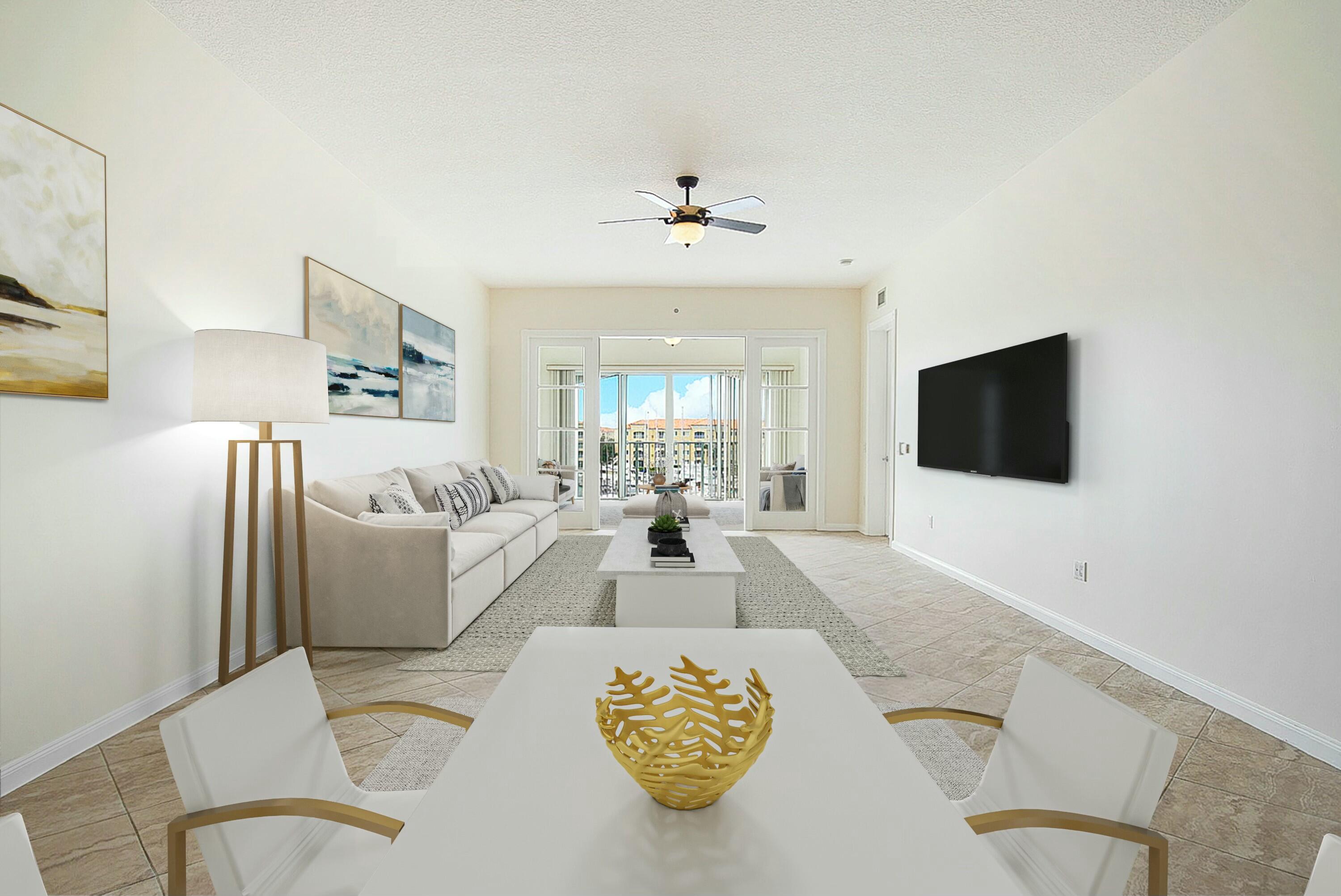 a living room with furniture a flat screen tv and a chandelier