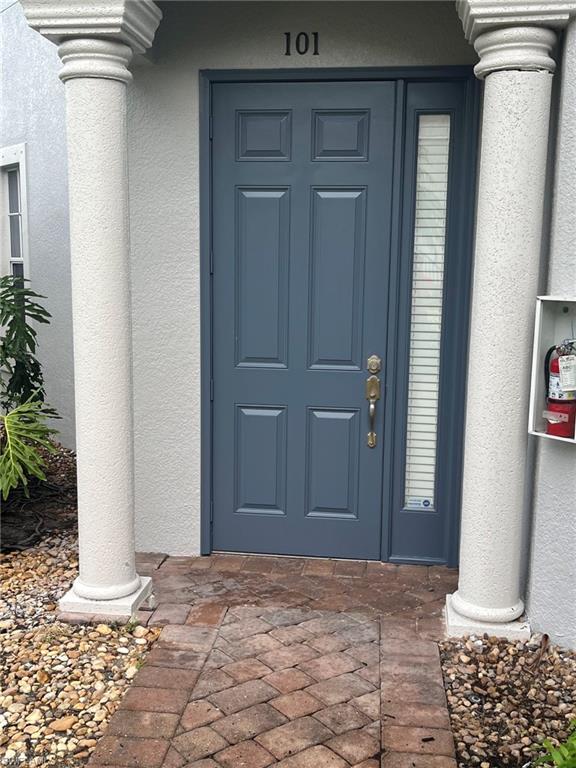 a view of entryway with front door