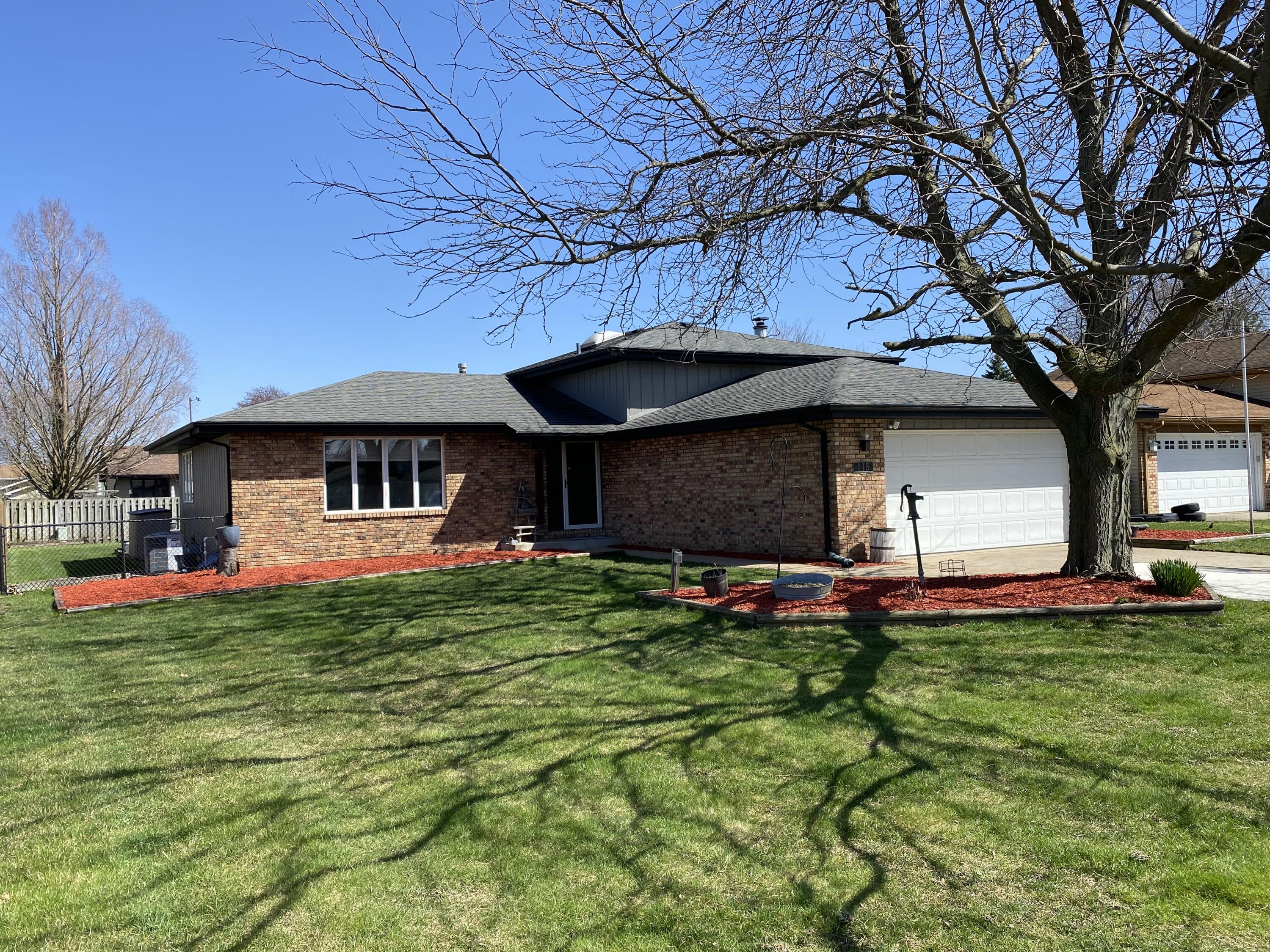 a front view of house with yard