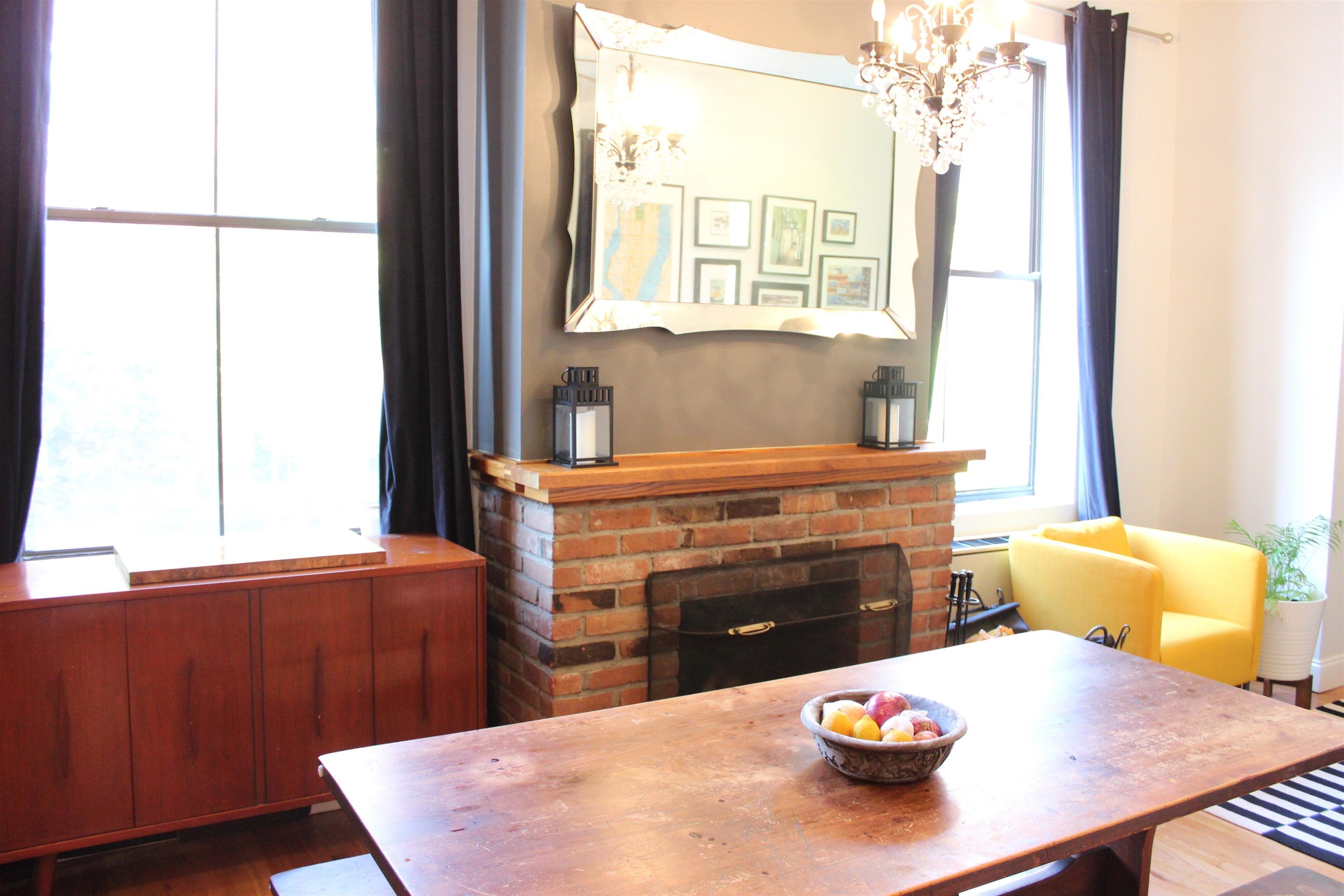 a dining room with a table and chairs