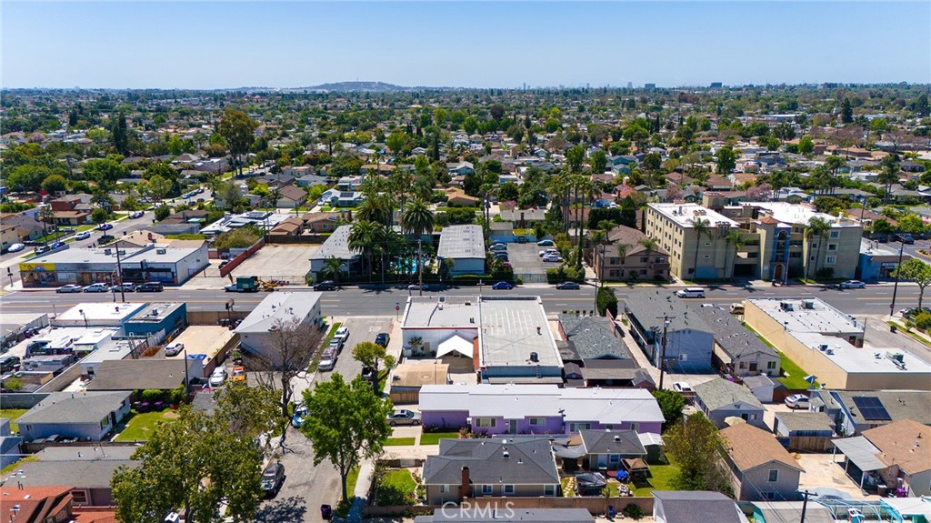 an aerial view of a city with lots of residential buildings