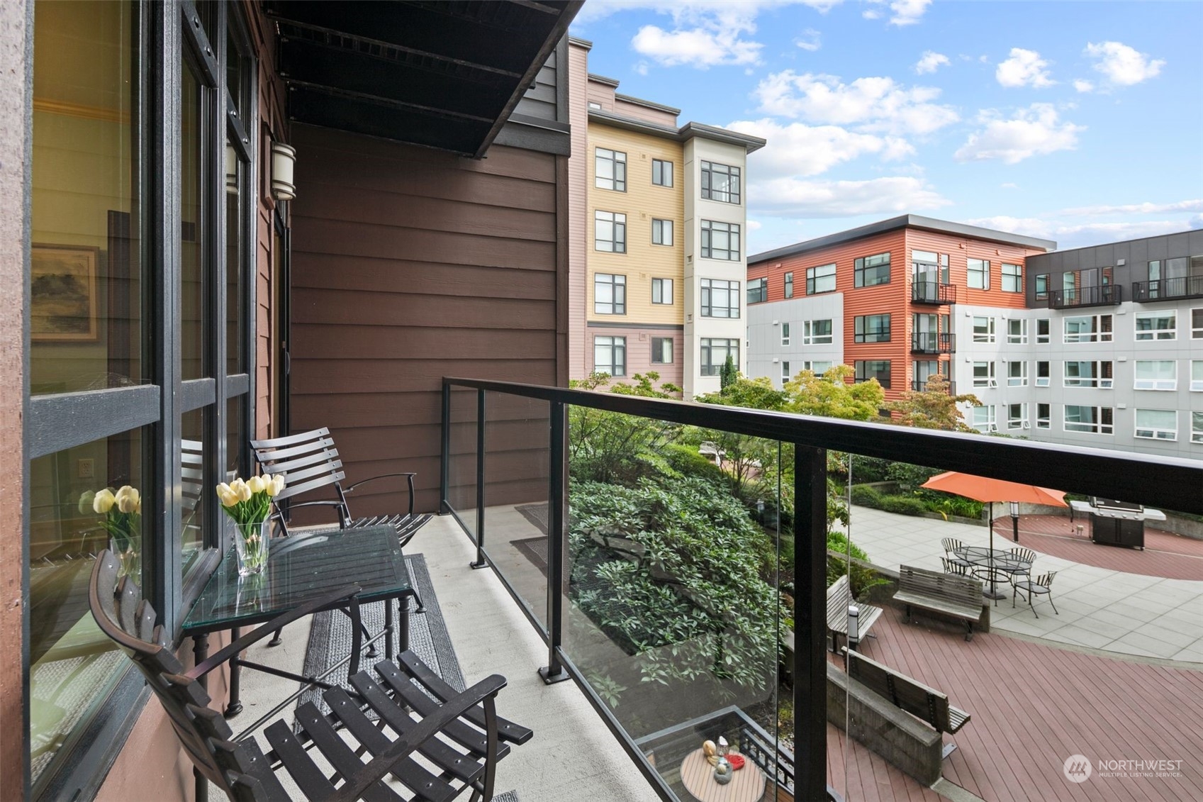 a view of balcony with chairs