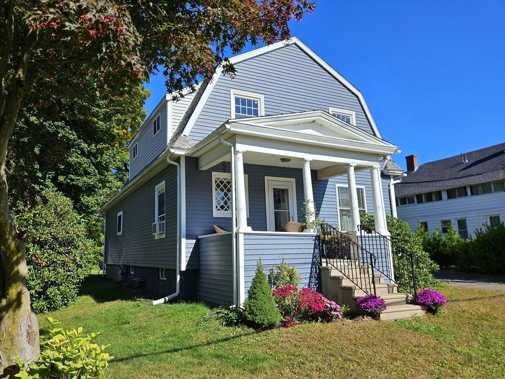 a front view of house with yard