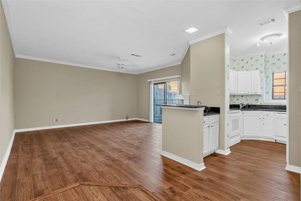 a view of kitchen with wooden floor