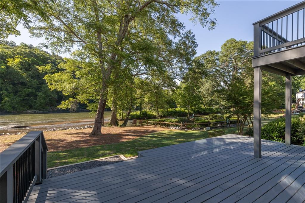 a view of a yard with wooden floor