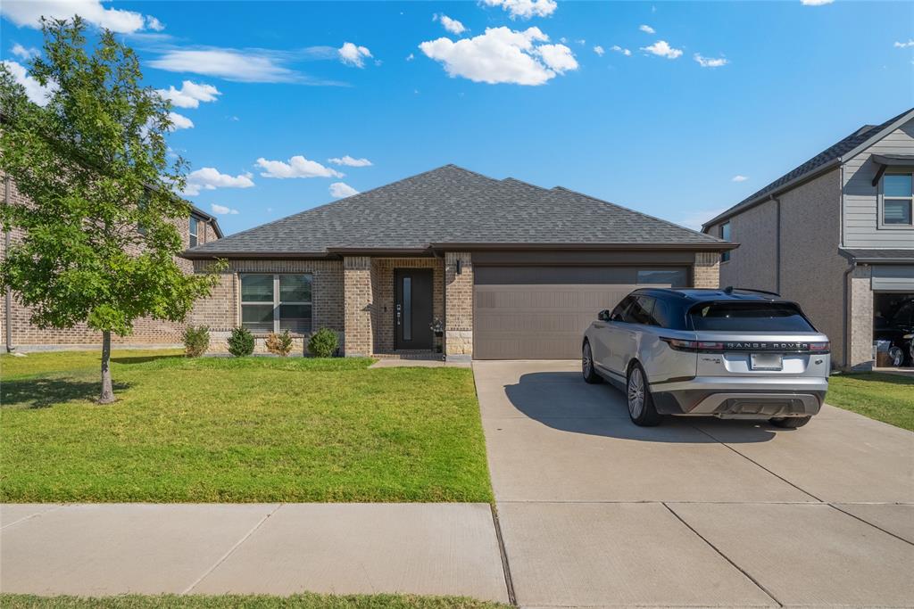 a car parked in front of a house