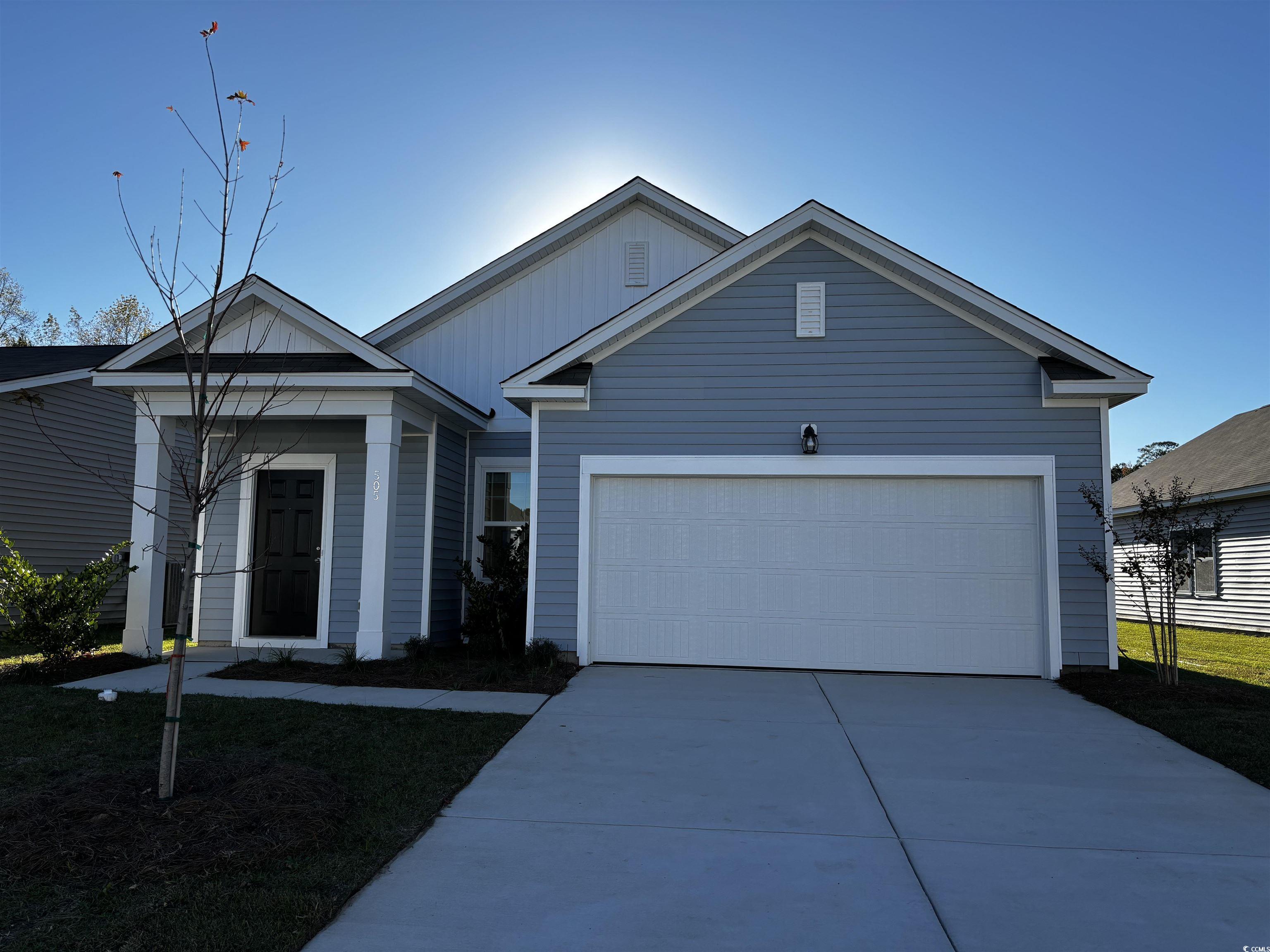 View of front of house with a garage