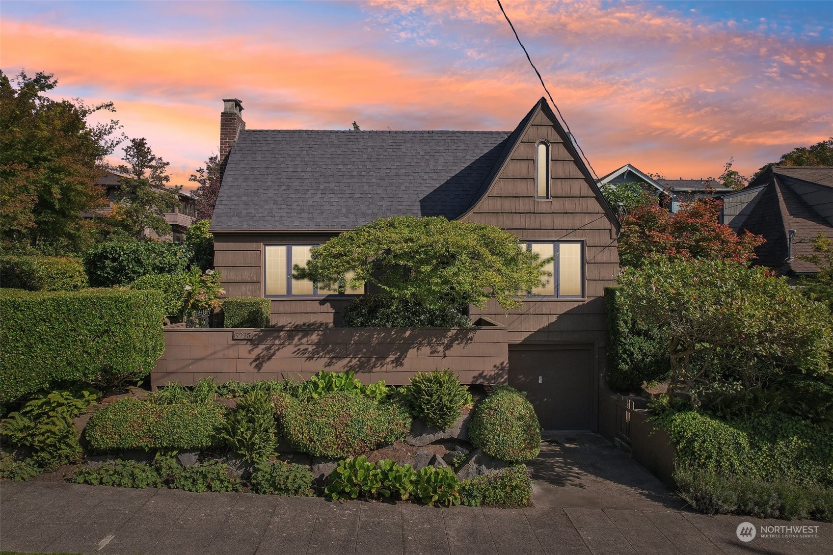 a house view with a garden space