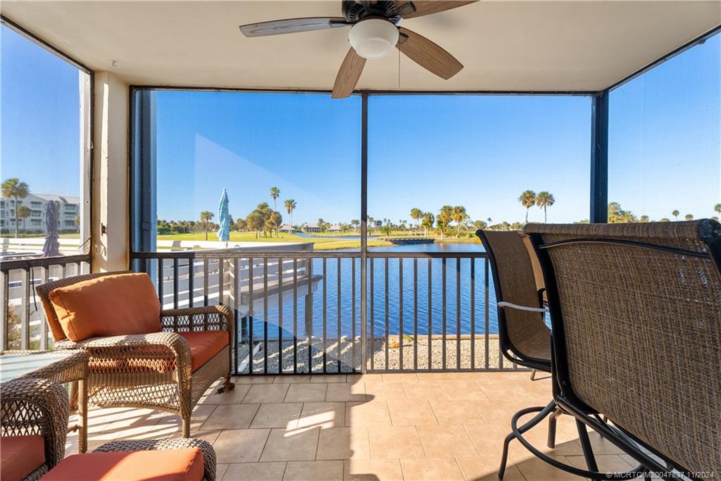 a balcony with view of outdoor seating