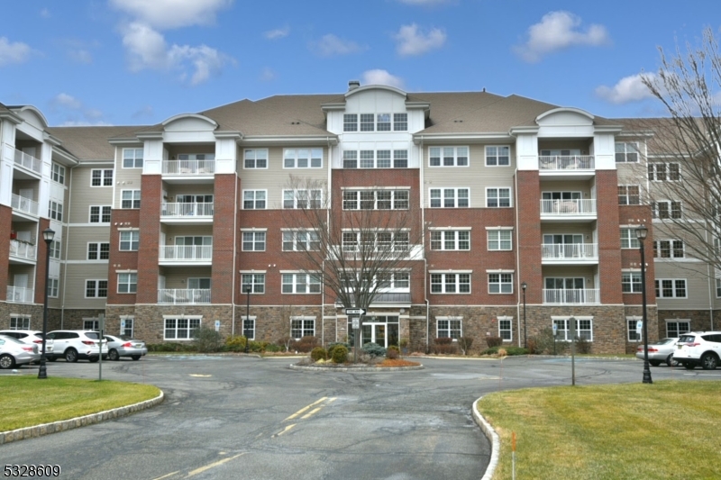 a front view of a building with street view