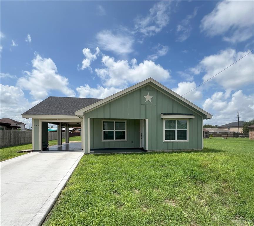 front view of house with a yard