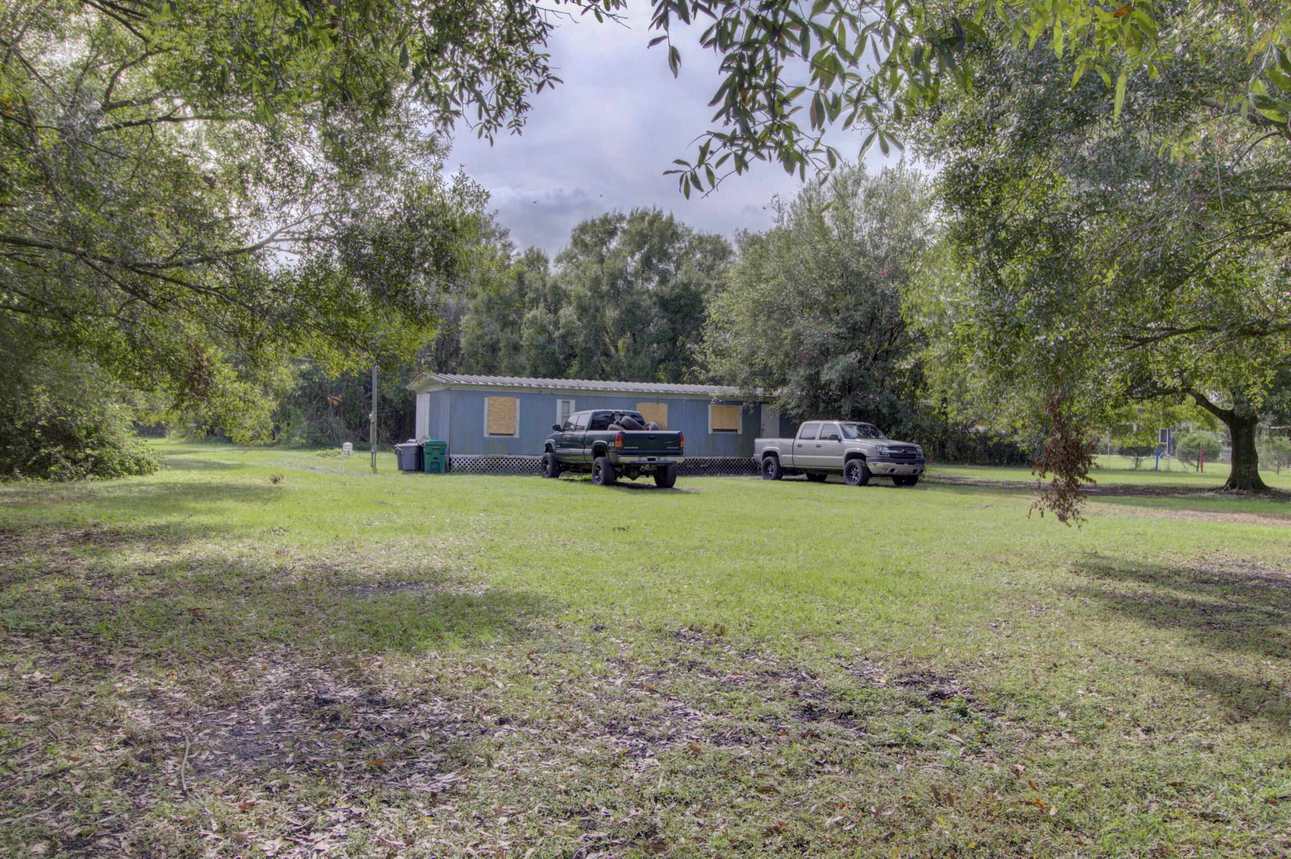 a view of a house with a back yard