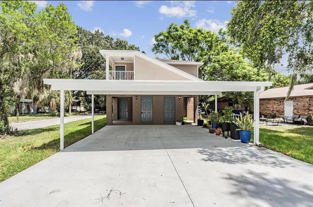 front view of a house with a yard