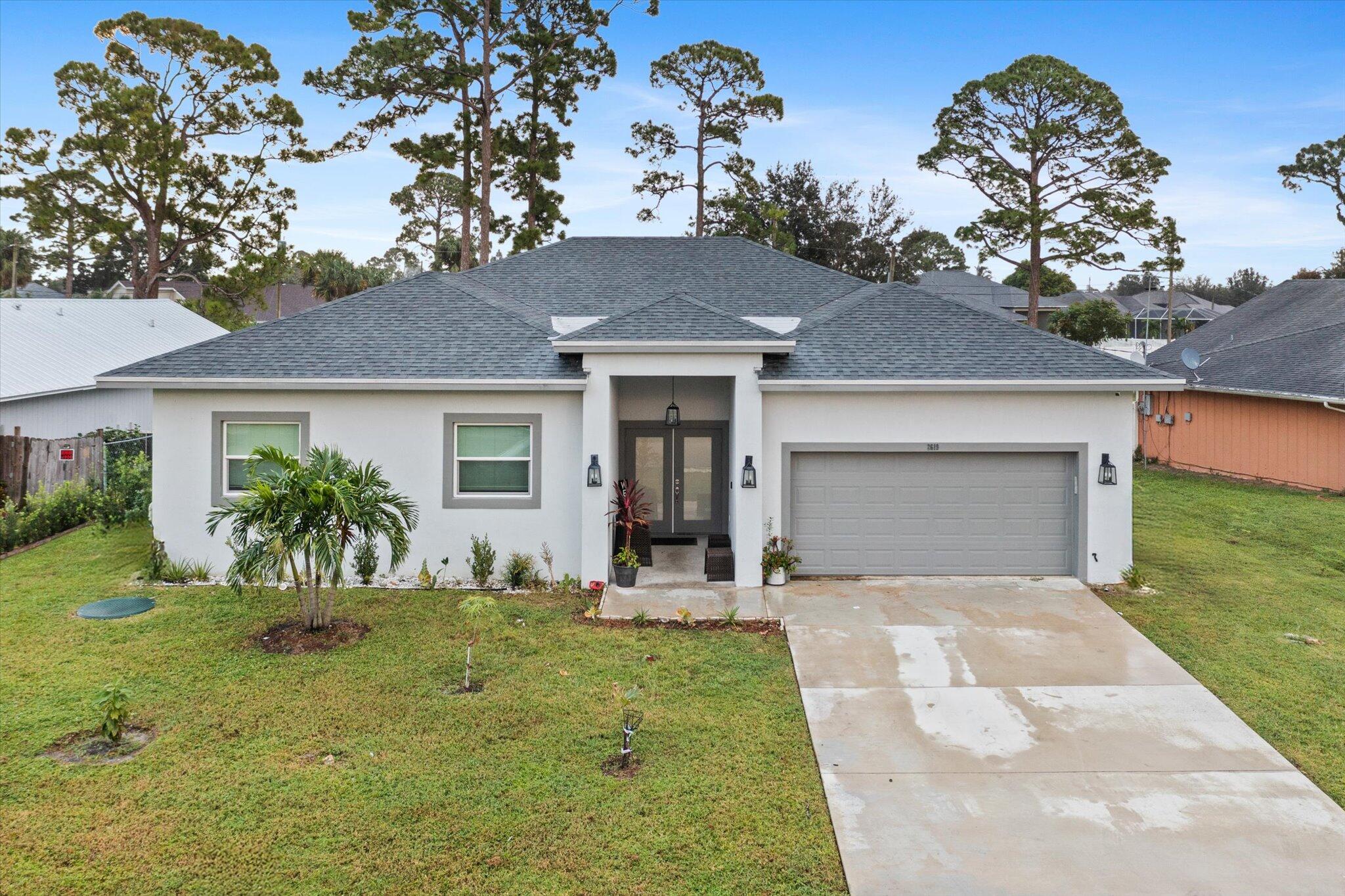 front view of a house with a yard