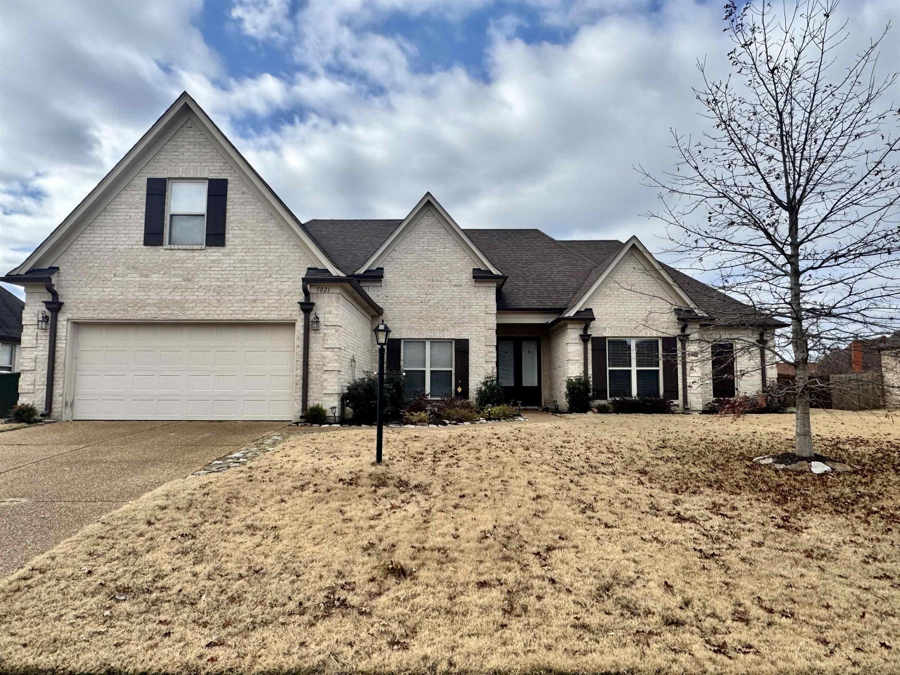 View of front of home featuring a garage