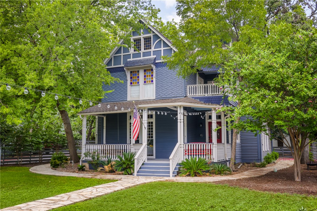 front view of a house with a yard