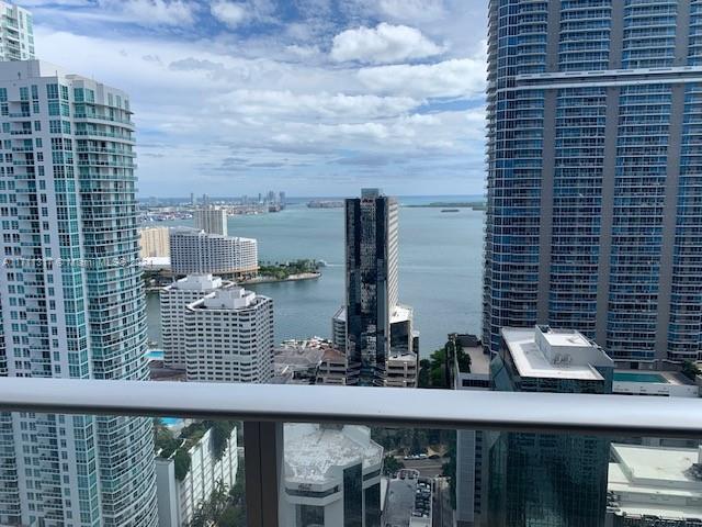 a view of buildings from the balcony