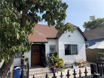 a front view of a house with yard