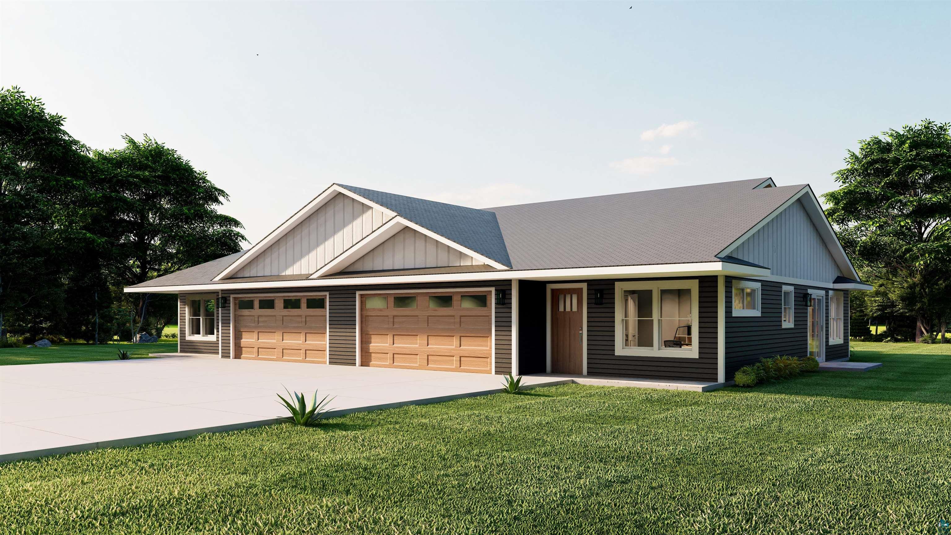 Ranch-style house with a front yard and a garage