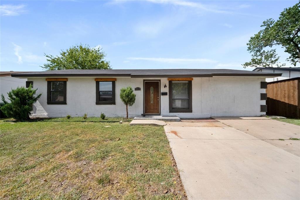 front view of house with a yard