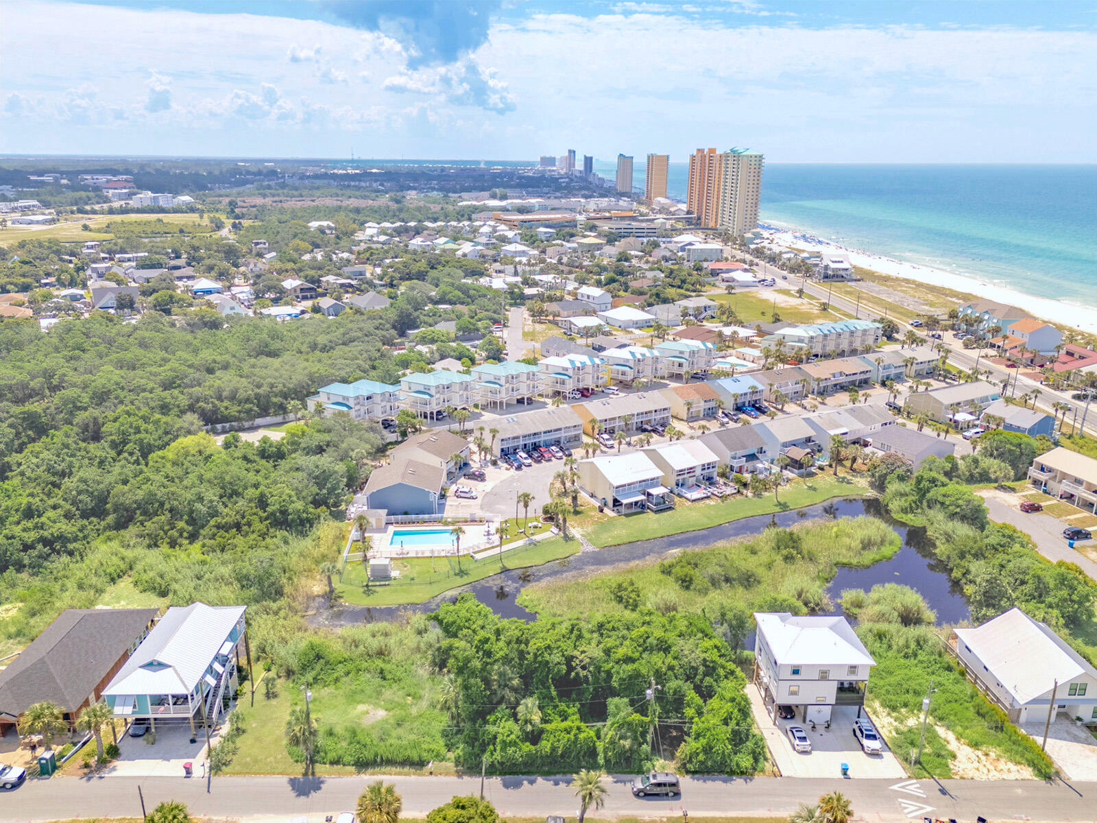 an aerial view of residential building and lake view