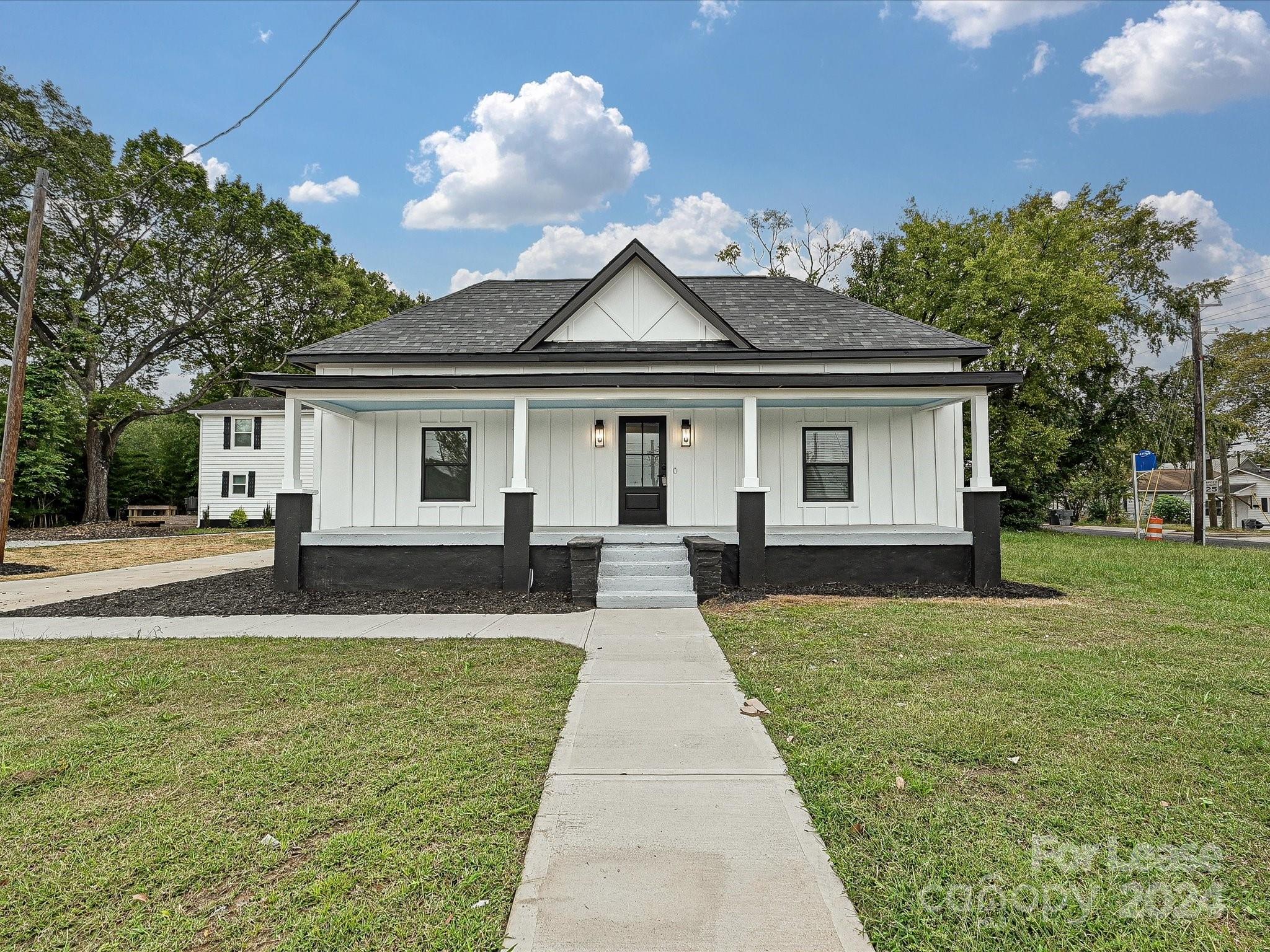 a front view of house with yard