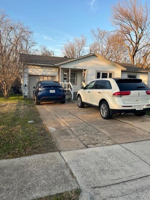 a view of a cars in front of a house