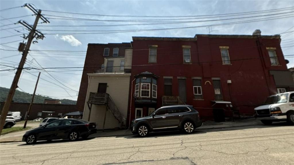 a car parked in front of a building