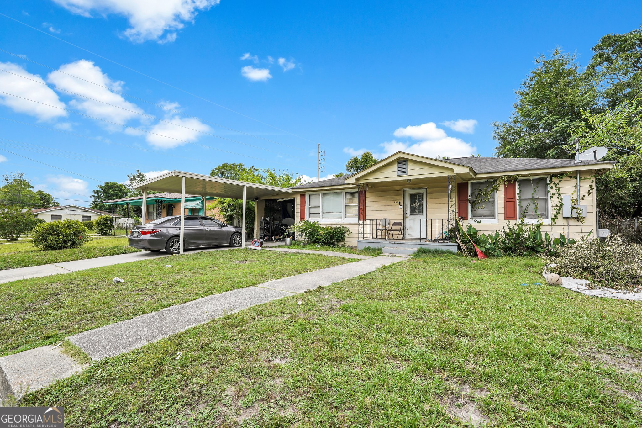 a front view of a house with a yard