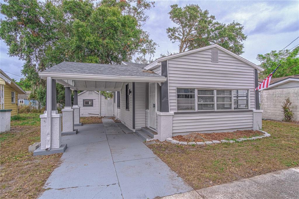 a front view of a house with a porch